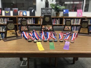 table with trophies and medals